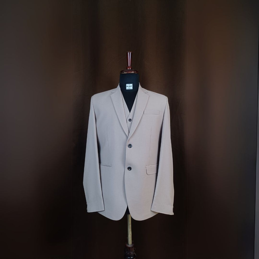 The Classic Beige Three-Piece Suit