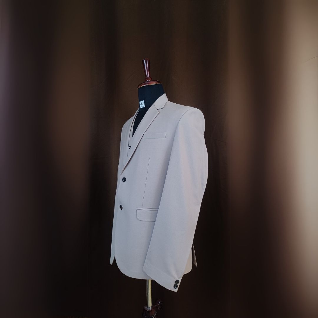 The Classic Beige Three-Piece Suit
